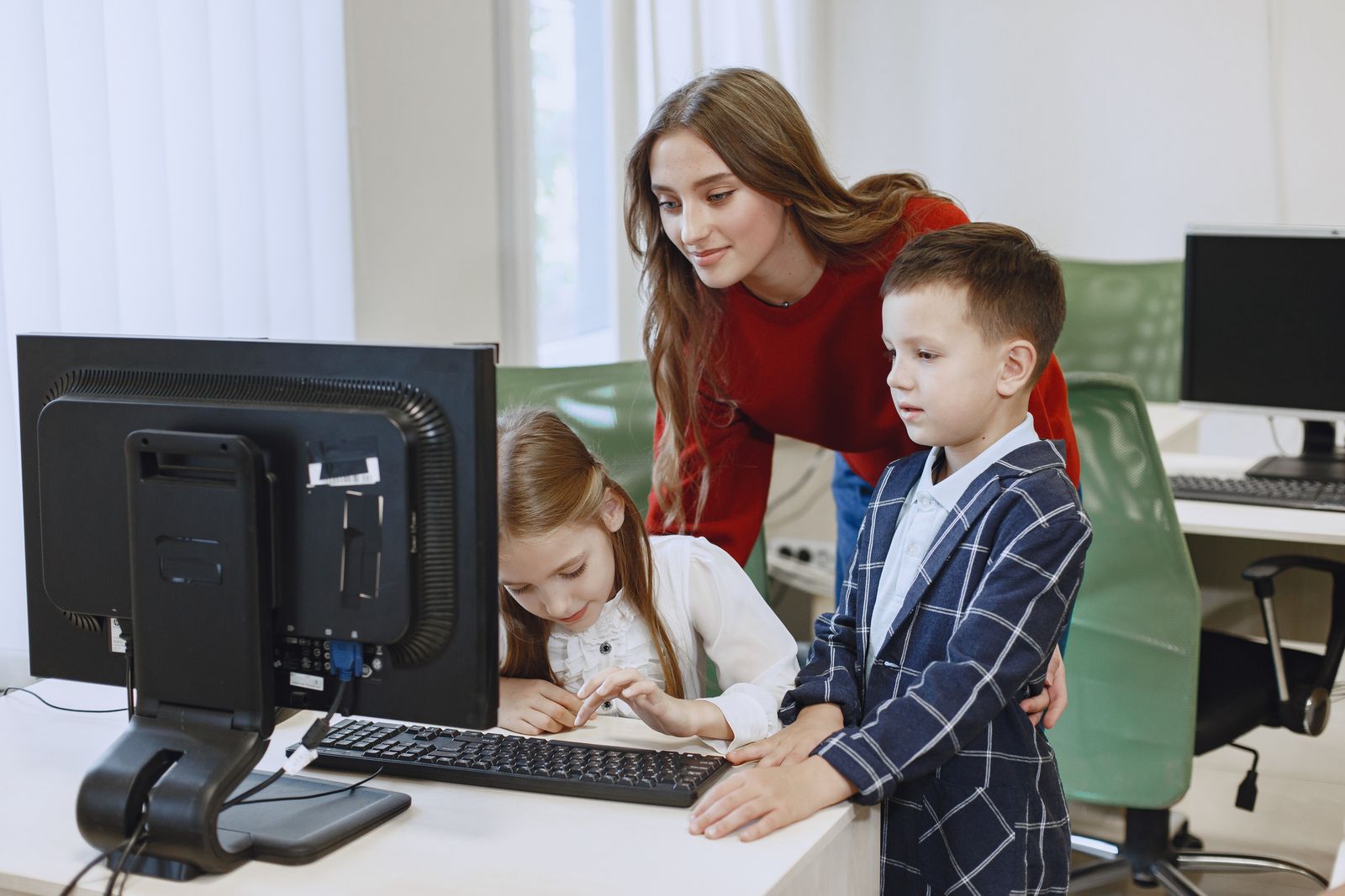 Family using a computer to check information